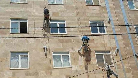 پیچ و رولپلاک نمای سنگ ساختمان شهریار